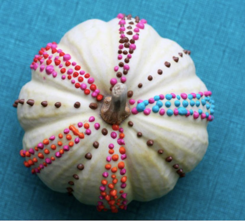 A puff painted white pumpkin