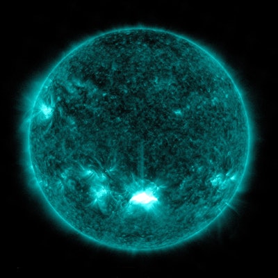 NASA’s Solar Dynamics Observatory captured this image of a solar flare — as seen in the bright flash...
