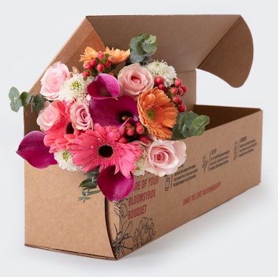 cardboard box full of flowers from bloomsybox