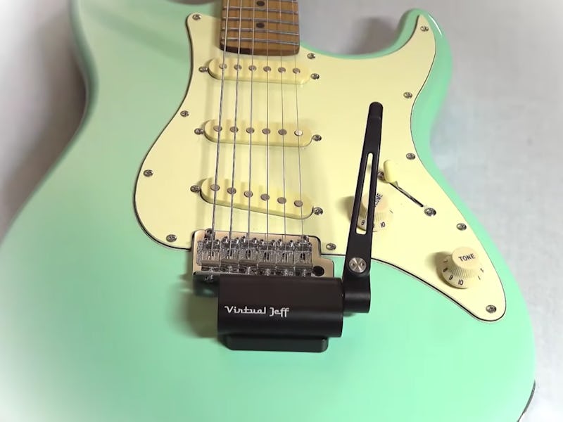 FomoFx promo image of Virtual Jeff Pro mounted to Fender Stratocaster
