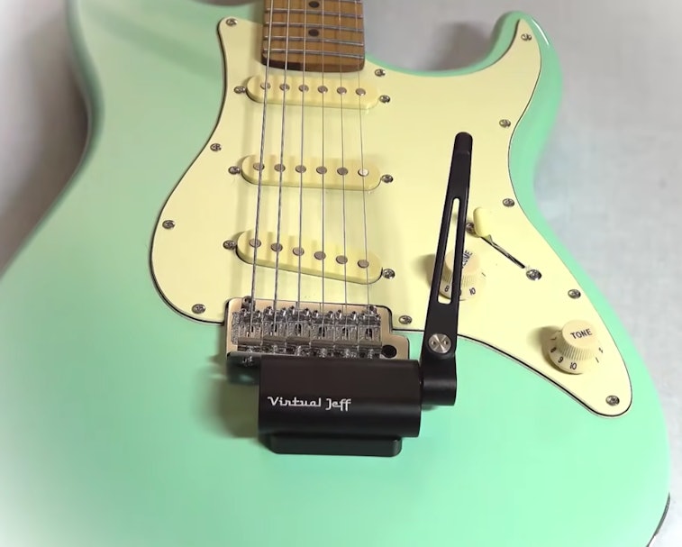 FomoFx promo image of Virtual Jeff Pro mounted to Fender Stratocaster