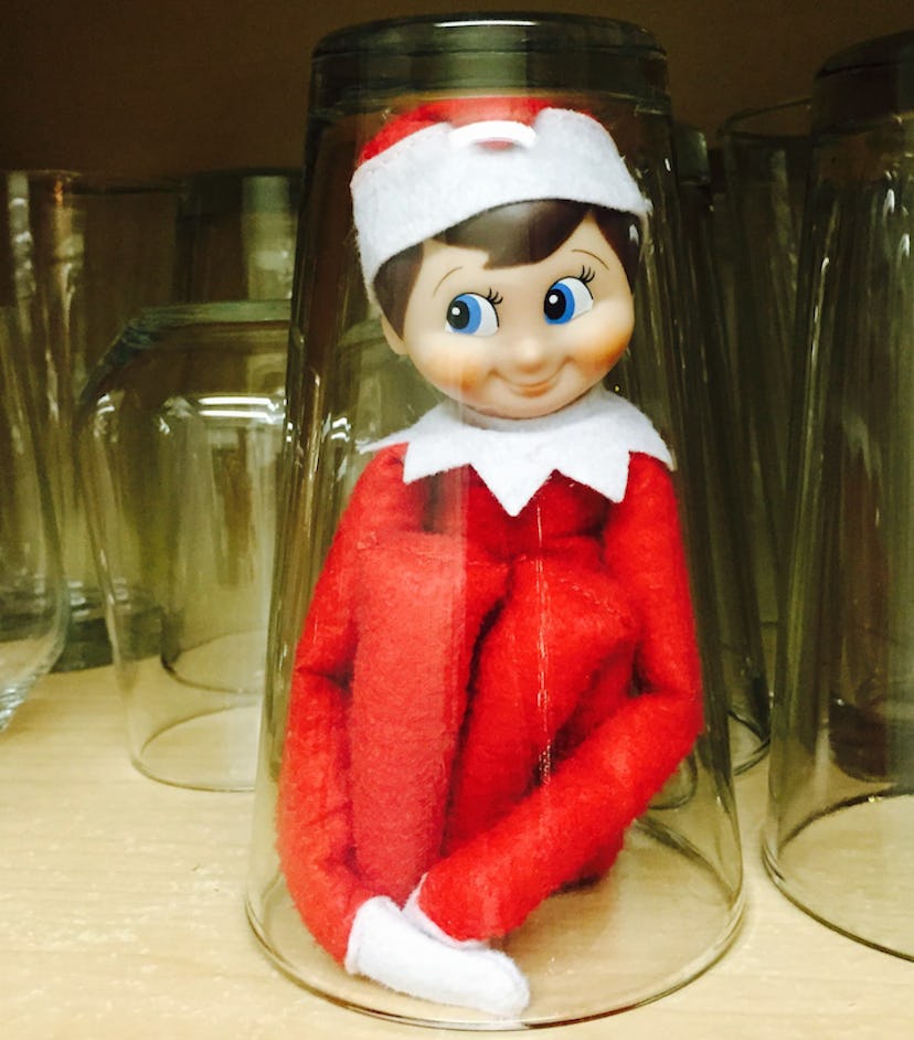 Trap your Elf on the Shelf in a glass where your toddler can't touch it.
