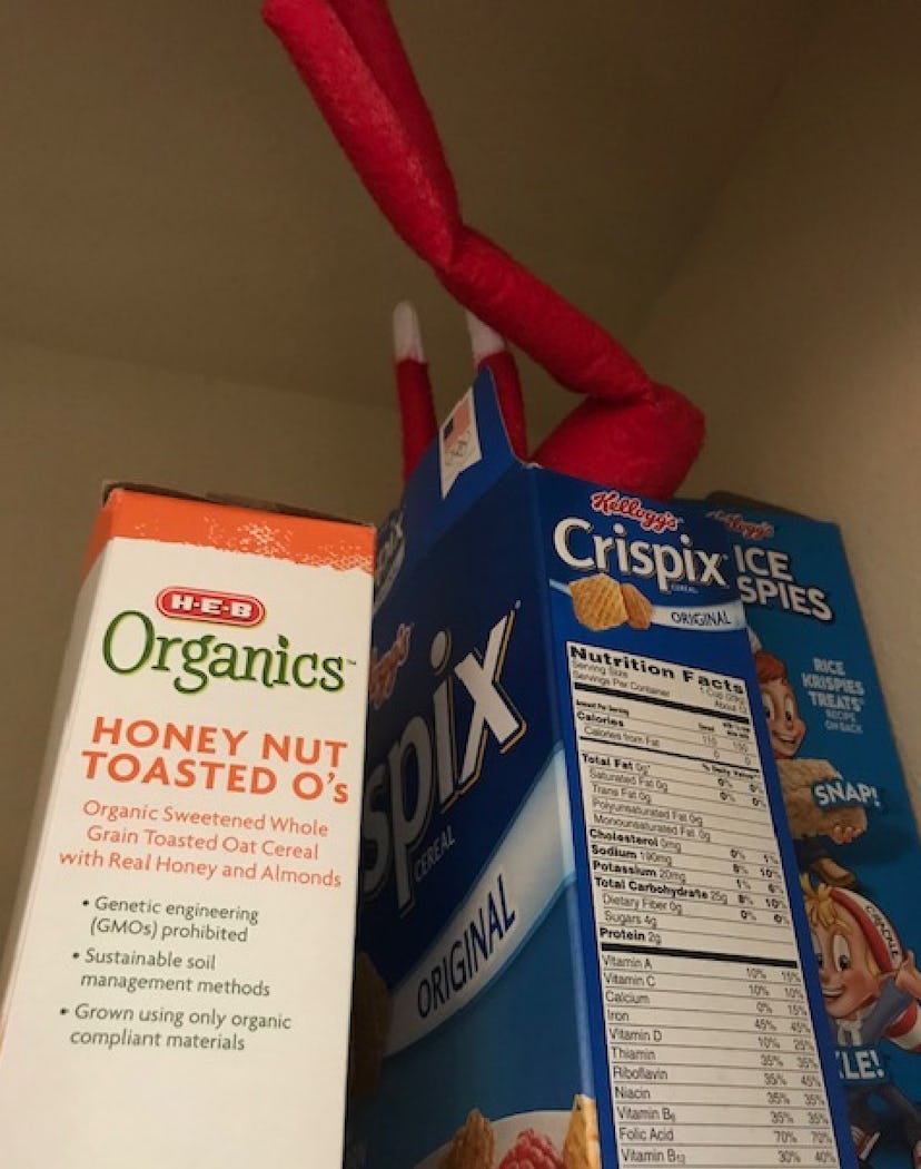 One easy Elf on the Shelf idea for toddlers is to hide your elf in a cereal box.