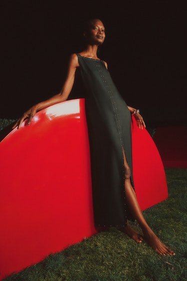 A female model in a black dress at Hermès spring 2022
