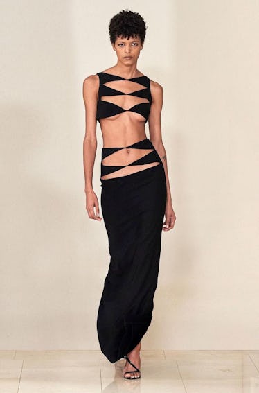 Model in Monot gown