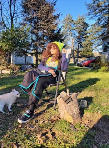 The author sits in a lawn chair wearing the Mozy Softshell