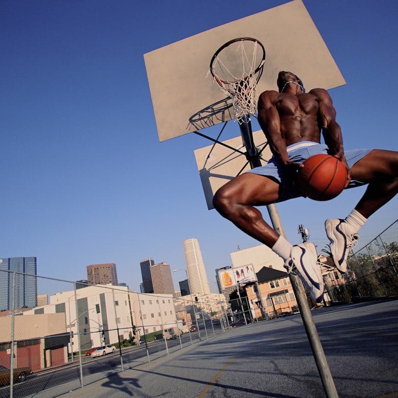 man playing basketball