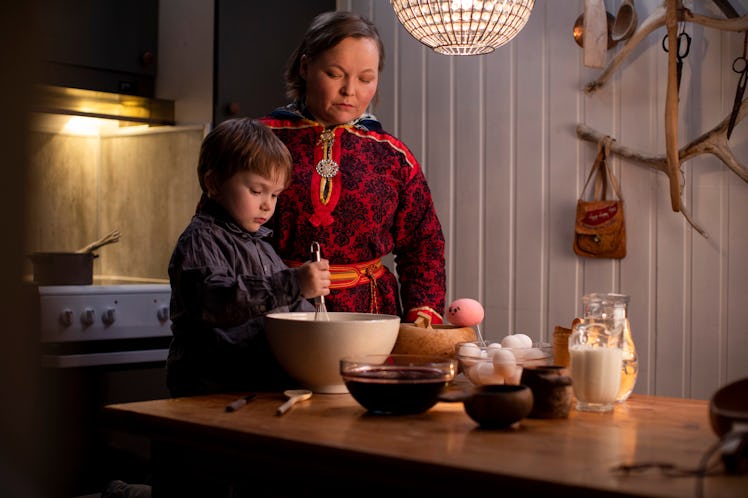 A mother and child prepare for a holiday meal in Norway in the new Waffles + Mochi holiday special.