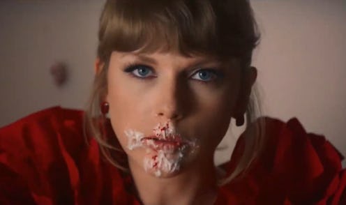 Taylor Swift eats cake in her "I Bet You Think About Me" music video.