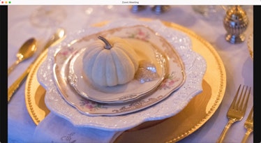 For an elevated holiday vibe, this white pumpkin Thanksgiving Zoom background is a good choice. 