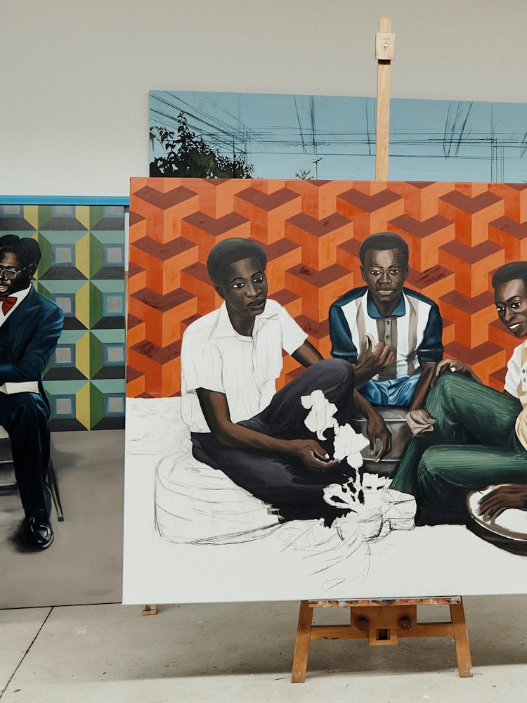Peter Uka's still unfinished painting of three men sitting 