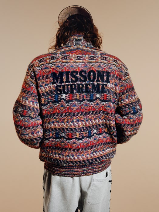 Back view of a Missoni Supreme branded sweater with multicolored knit pattern