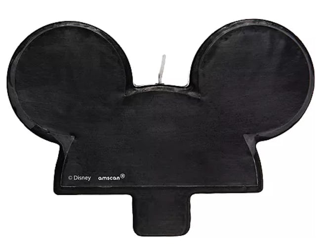 Image of a cake candle shaped like Mickey Mouse ears.