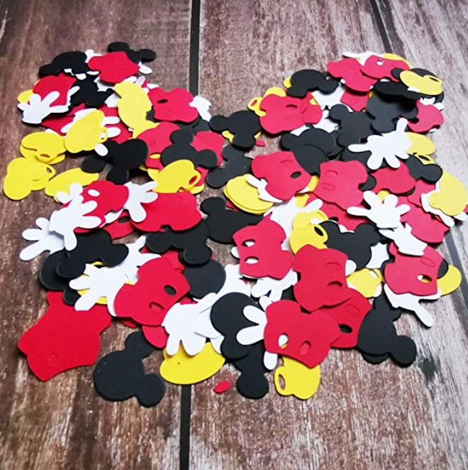 Image of multi-colored Mickey Mouse-themed confetti.