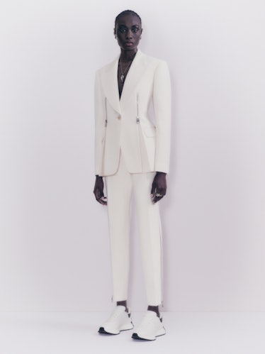 Model in white suit from Alexander McQueen