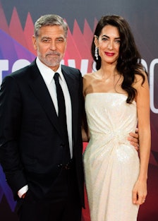  George Clooney and Amal Clooney attend "The Tender Bar" Premiere
