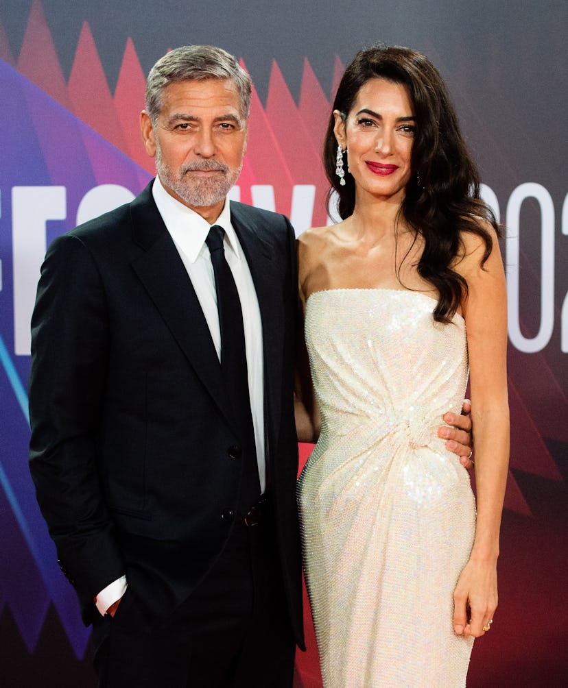 George Clooney and Amal Clooney attend "The Tender Bar" Premiere