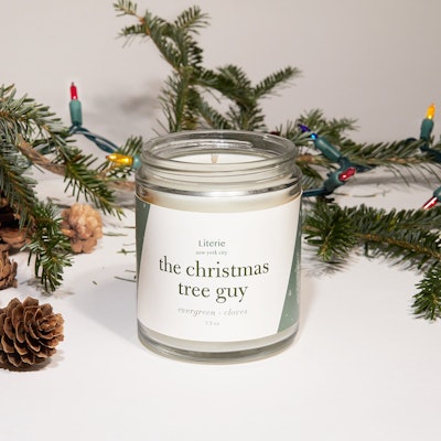 a candle called "the christmas tree guy" is a cozy gift for homebodies