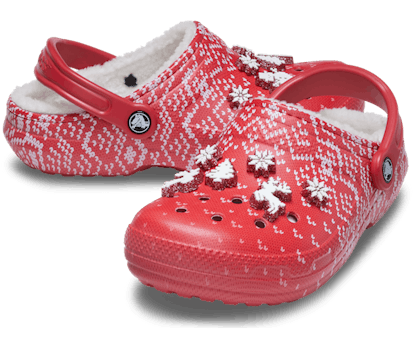 Crocs' Lined Holiday Charm Clogs in red and white with matching Jibbitz.