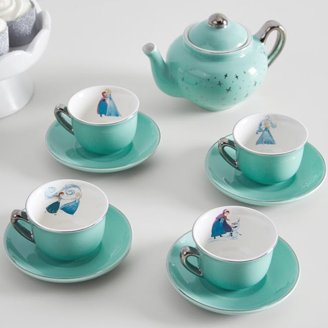 Image of a teal blue porcelain tea set with Disney's Frozen characters.