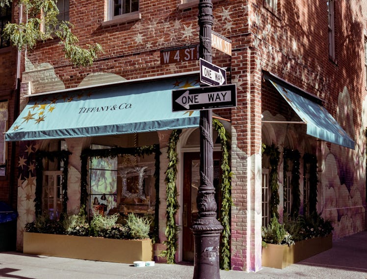 An orange brick building in New York with a Tiffany & Co. corner store
