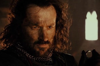 Isildur holding the One Ring in Lord of the Rings: The Fellowship of the Ring