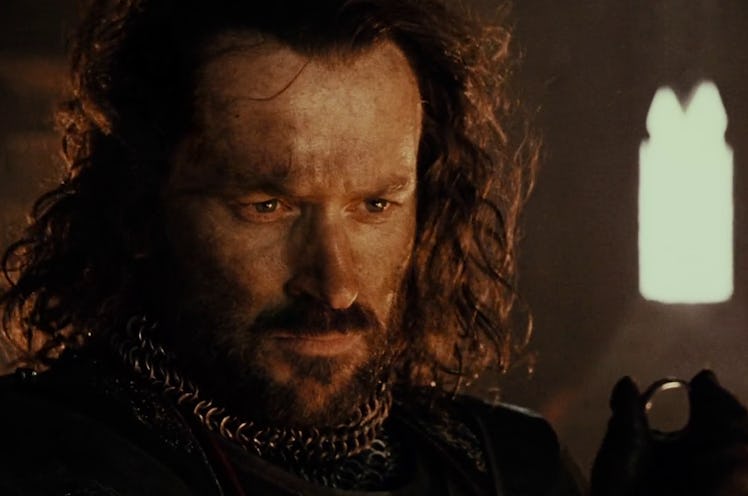 Isildur holding the One Ring in Lord of the Rings: The Fellowship of the Ring