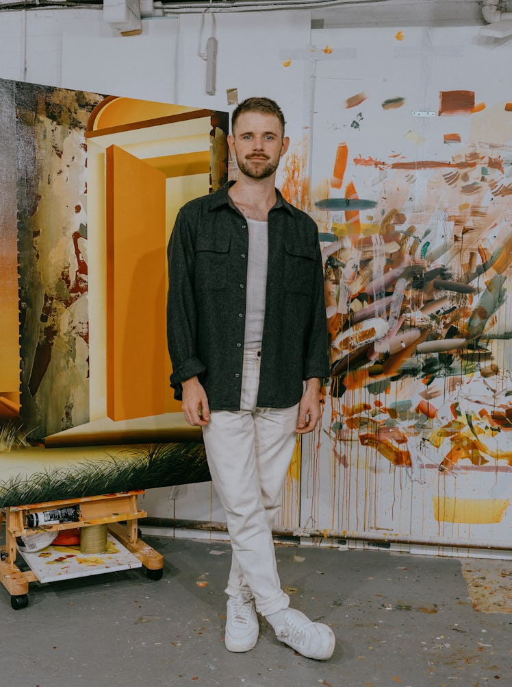 Kyle Dunn posing in his Brooklyn studio
