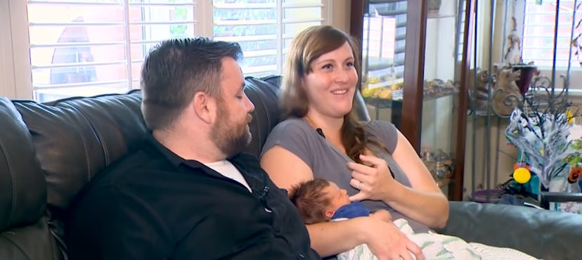 Emily and Michael Johnson with their newborn son, Thomas.