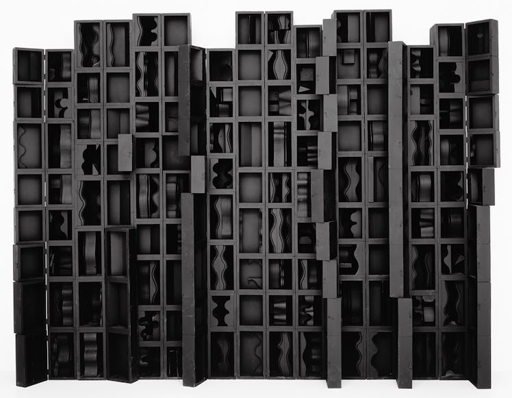 Black sculpture by Louise Nevelson, titled Cascade VII, 1979.