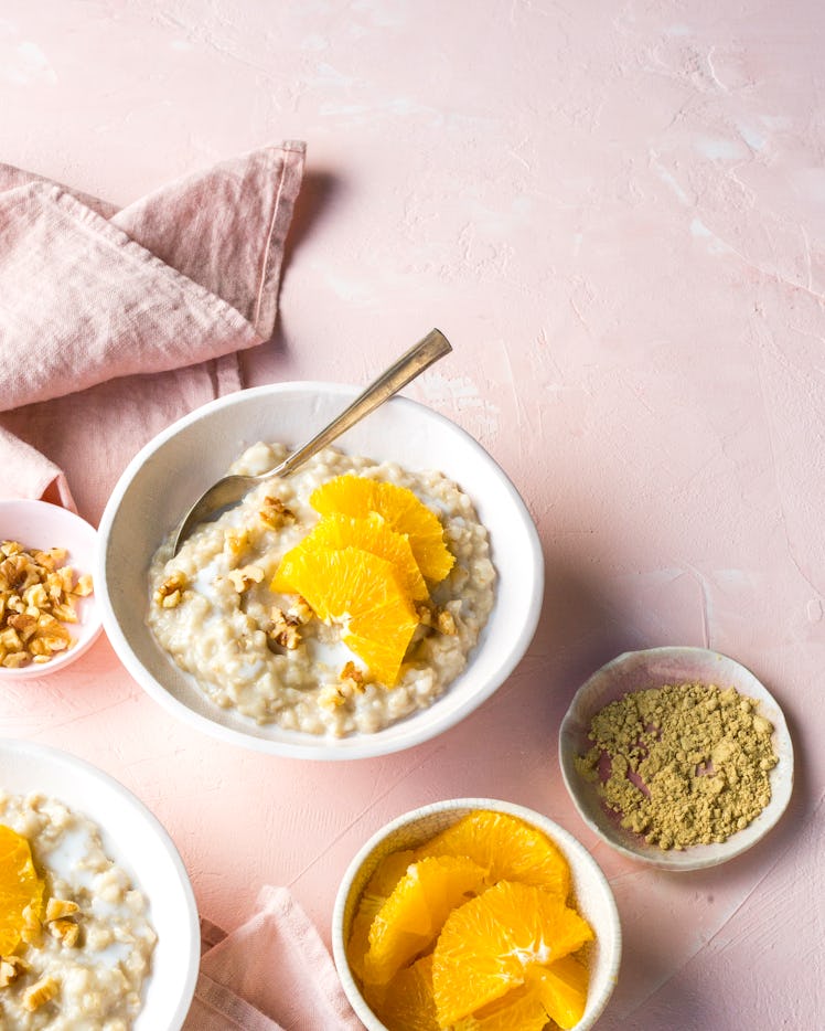 Bowls of orange slices and oatmeals