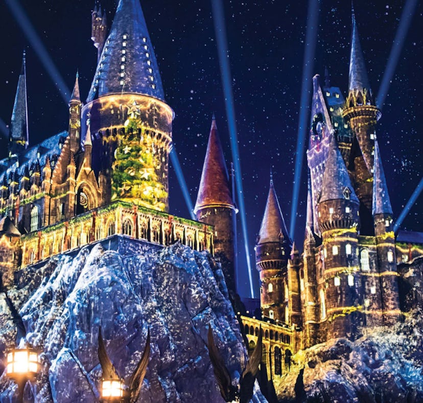 The Hogwarts castle lights up during the holidays at Universal along with the Universal 2021 holiday...