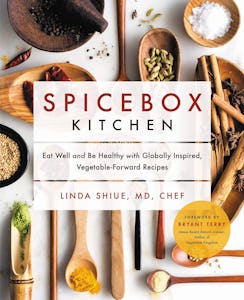 A recipe book with "Spicebox Kitchen" text cover