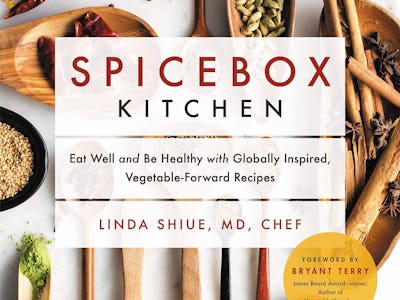 A recipe book with "Spicebox Kitchen" text cover