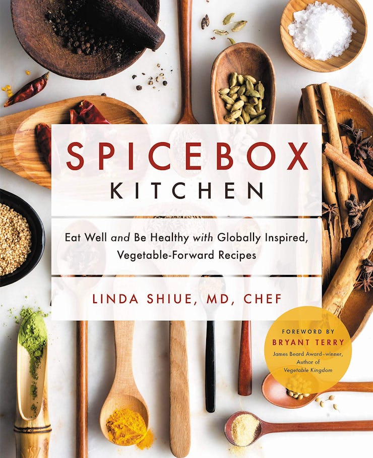 A recipe book with "Spicebox Kitchen" text cover