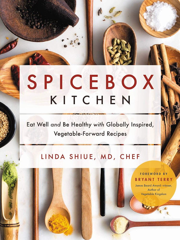 A recipe book with "Spicebox Kitchen" text cover
