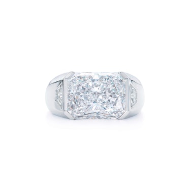 Kwiat Engagement Ring with a Radiant Diamond and Flush Set Side Stones