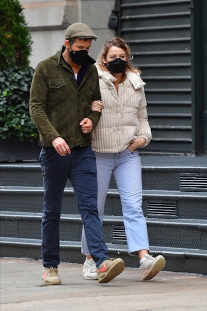 Blake Lively and Ryan Reynolds wearing matching sneakers. 