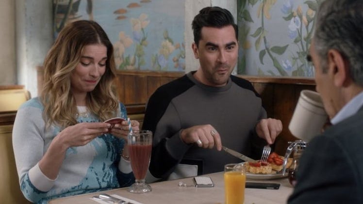 Dan Levy as David Rose eating brunch in 'Schitt's Creek'