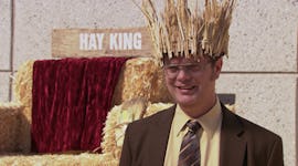 Dwight wears a hay bale hat in an episode of 'The Office.'