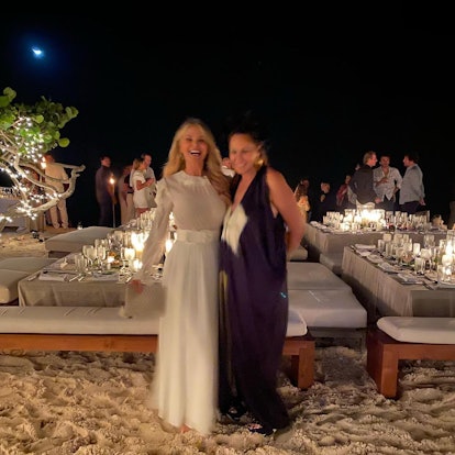Christie Brinkley and Donna Karan at a seaside dinner party