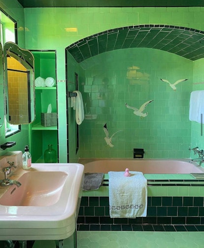 Green bathtub with products