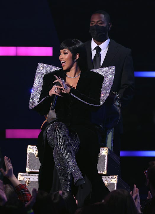 Host Cardi B speaks onstage during the 2021 American Music Awards 