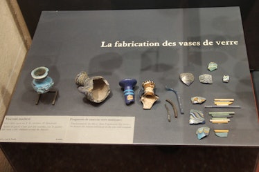 A display of ancient Egyptian glass making in the Louvre museum in Paris.