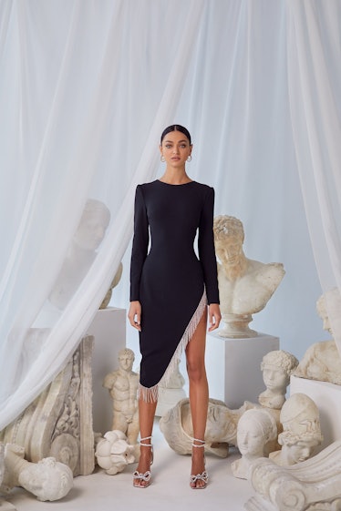 Asymmetrical black long sleeve dress with crystal fringe embellishment 