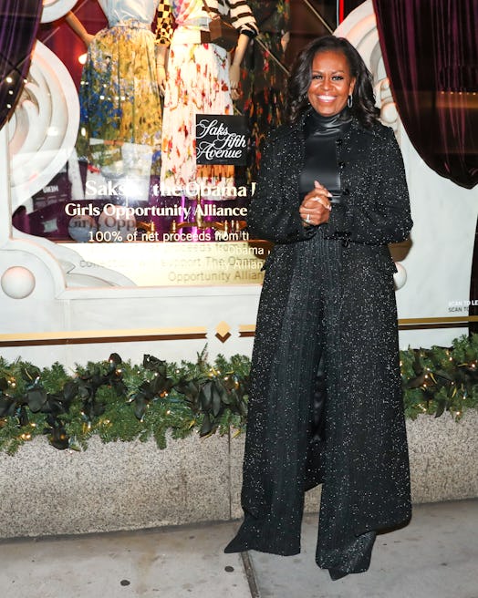 Michelle Obama outside holiday windows at Saks