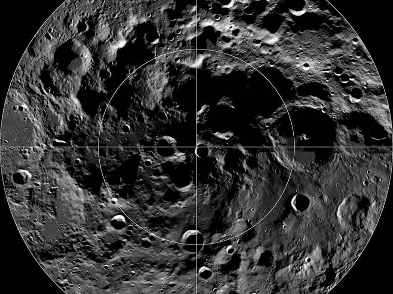 An overhead view of the moon's south pole.