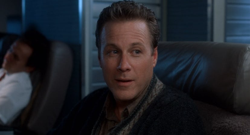 Kevin's dad in Home Alone, smiling aboard a plane.