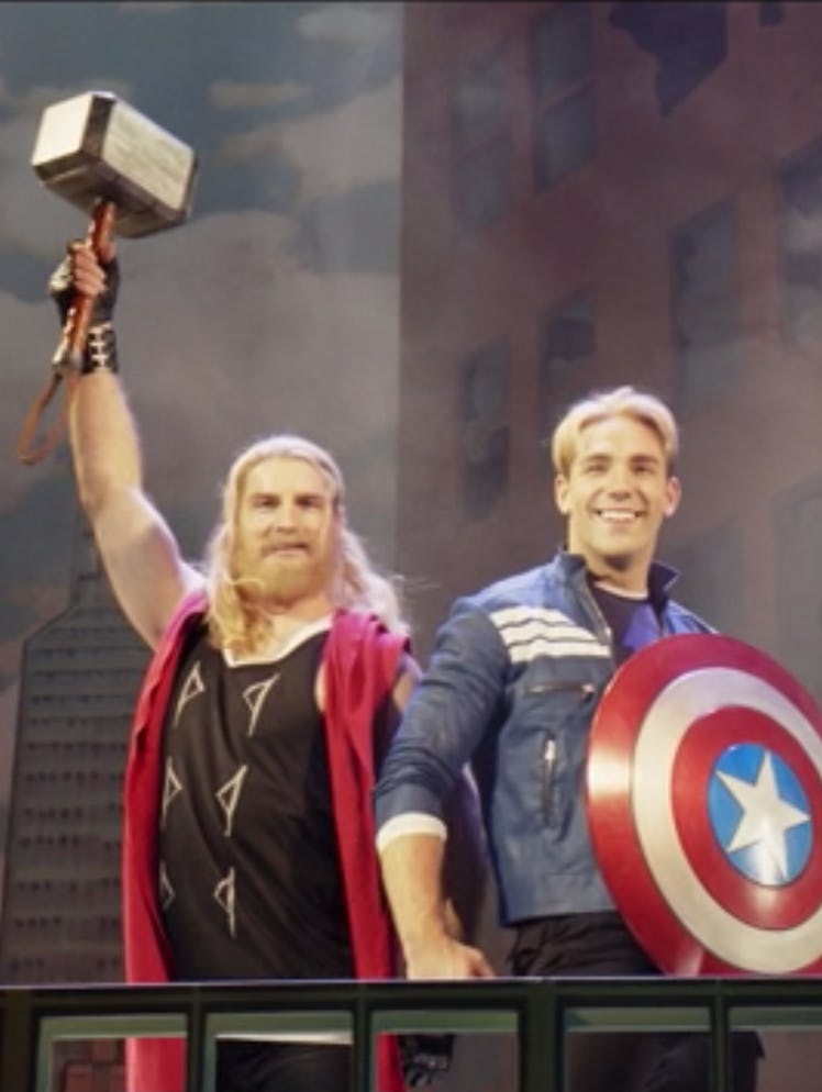 Two men dressed as Thor and Captain America on a stage in the musical Hawkeye