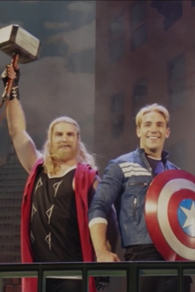 Two men dressed as Thor and Captain America on a stage in the musical Hawkeye